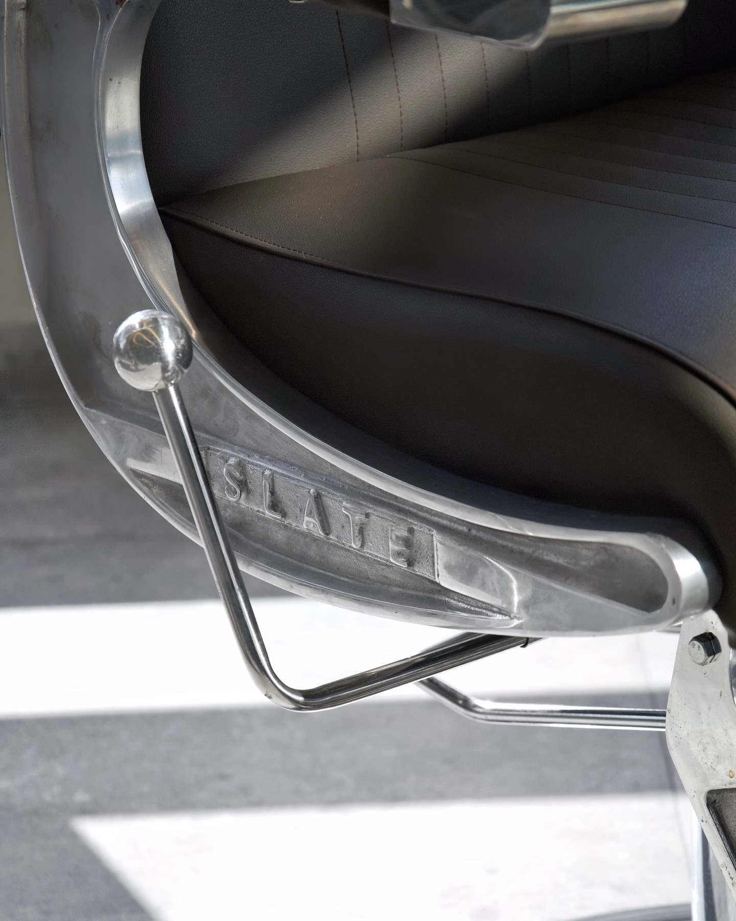 SLATE branded barber chair detail